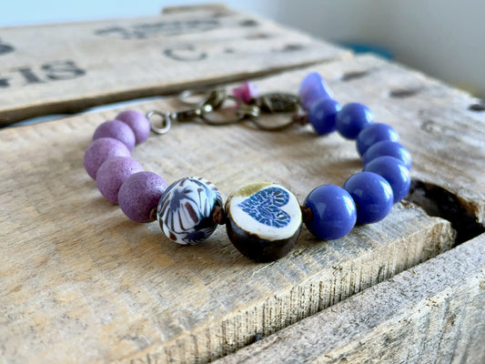 Boho Bracelet with Rustic Heart Charm – Handmade Ceramic & Purple Glass Beads on Linen Cord – Gift for Her