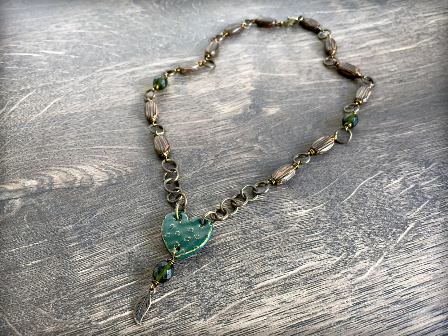 Emerald Green Artisan Ceramic Heart Necklace with Brass Chain. Rustic Wooden Bead Necklace. Unique Handcrafted Jewellery