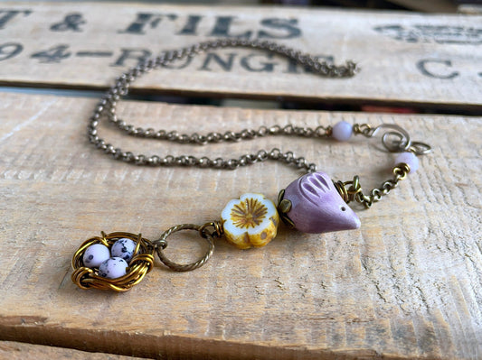 Whimsical Bird & Nest Pendant with Brass Chain.  Artisan Ceramic Necklace. Purple and White Jewellery