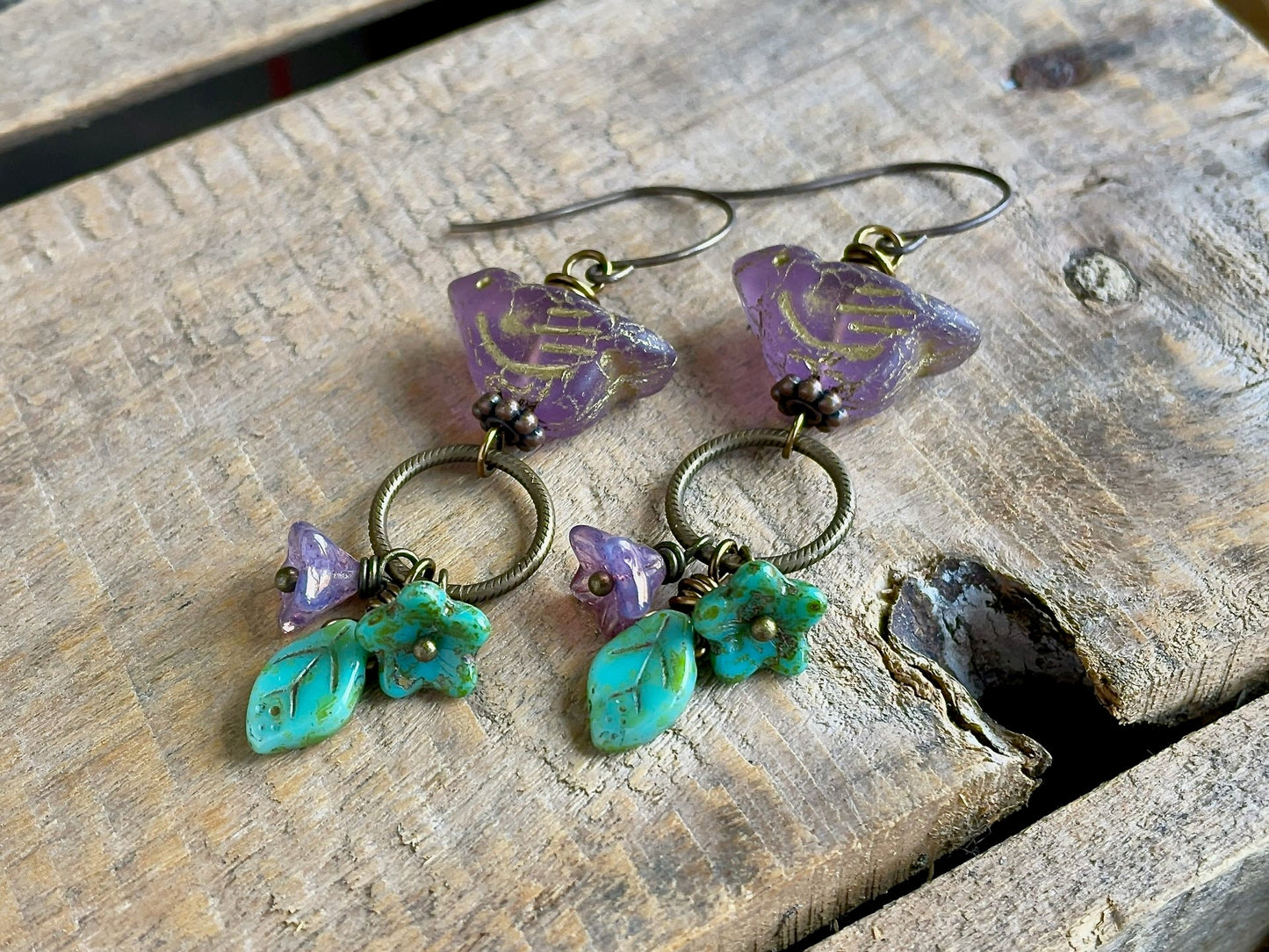 Nature Inspired Earrings featuring Czech Glass Birds, Leaves and Flowers. Colourful Purple & Green Cluster Earrings. Bohemian Jewellery